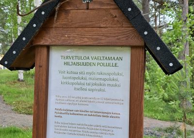 Talonmuotoinen opastekyltti